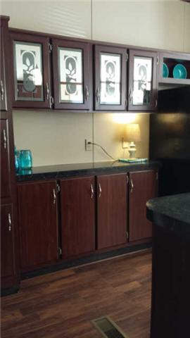 Plenty of extra storage space and countertops in this kitchen. 