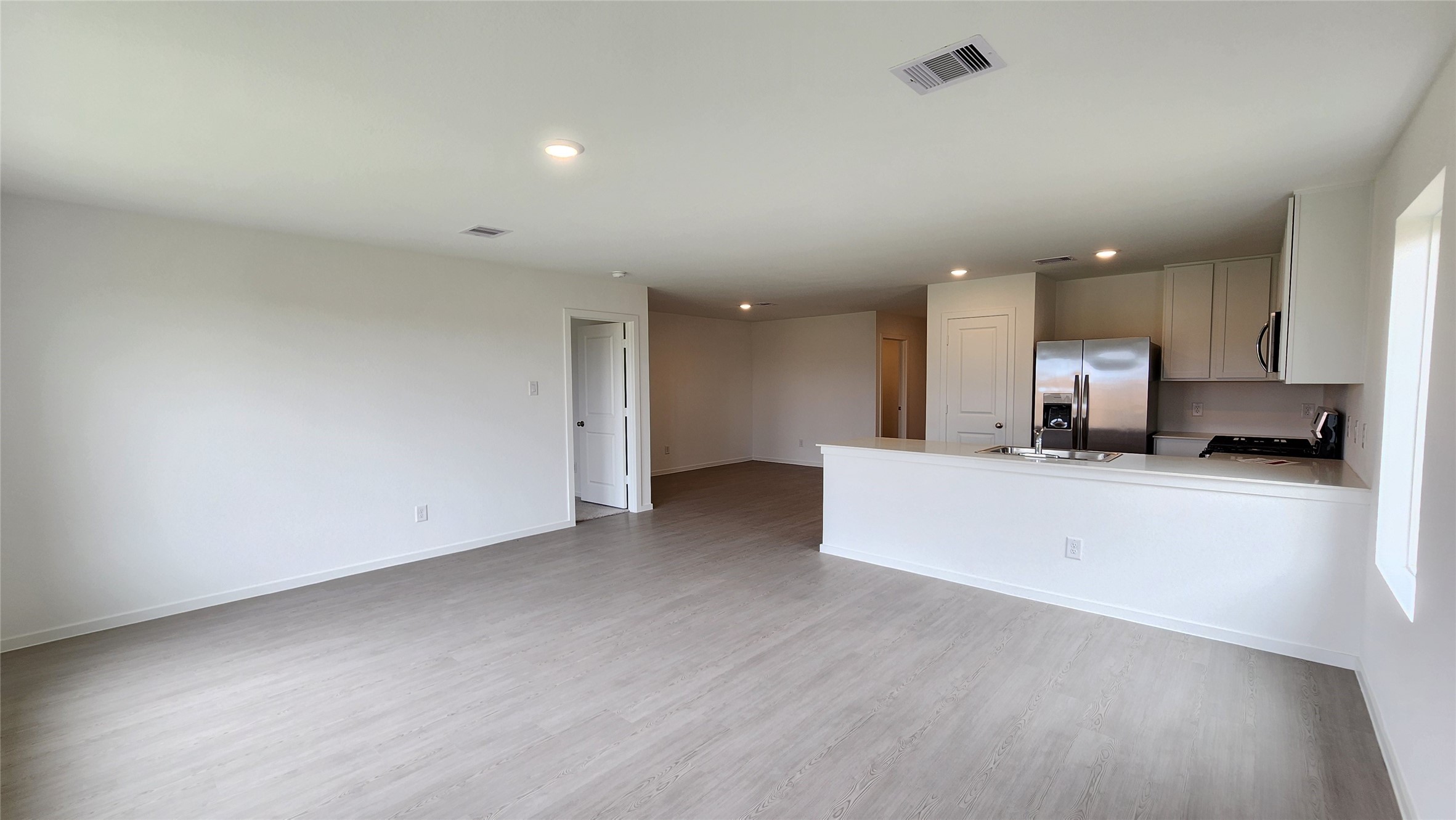 29018 Rustic Windmill Way Hockley, TX 77447 - Photo 7 of 35 Family room to kitchen