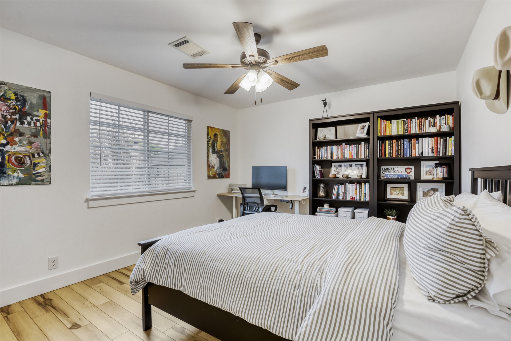 104 Aspen Trail Georgetown, TX 78626 - Photo 21 of 29 a bedroom with a large bed and a window