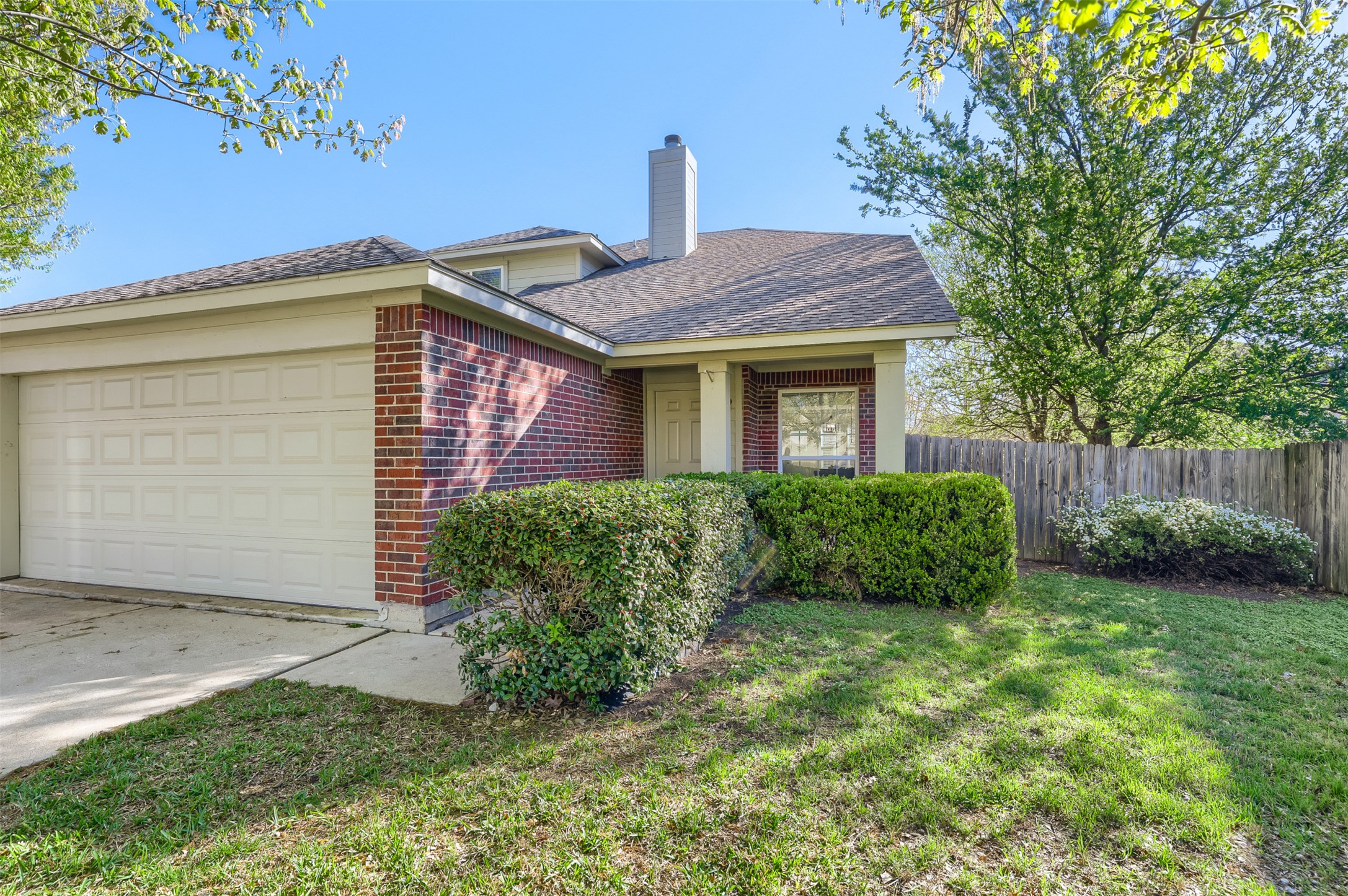 104 Aspen Trail Georgetown, TX 78626 - Photo 4 of 29 a front view of a house with garden