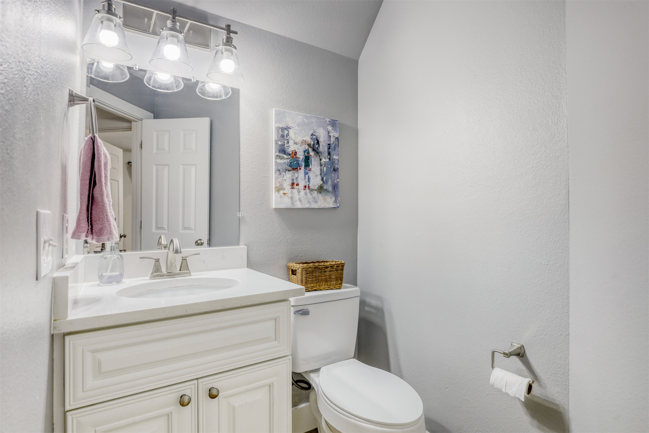 104 Aspen Trail Georgetown, TX 78626 - Photo 9 of 29 a bathroom with a sink vanity mirror and toilet