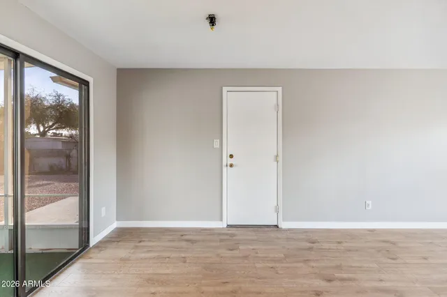 a view of an empty room with window