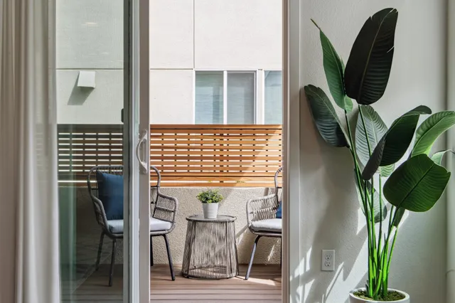 a kitchen with stainless steel appliances a stove sink microwave and cabinets