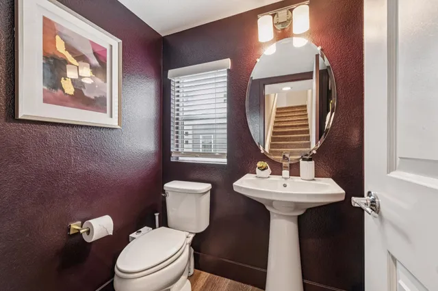 a blue chair sitting in front of a door