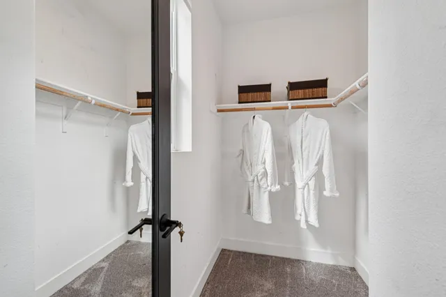 a bathroom with a double vanity sink mirror and double