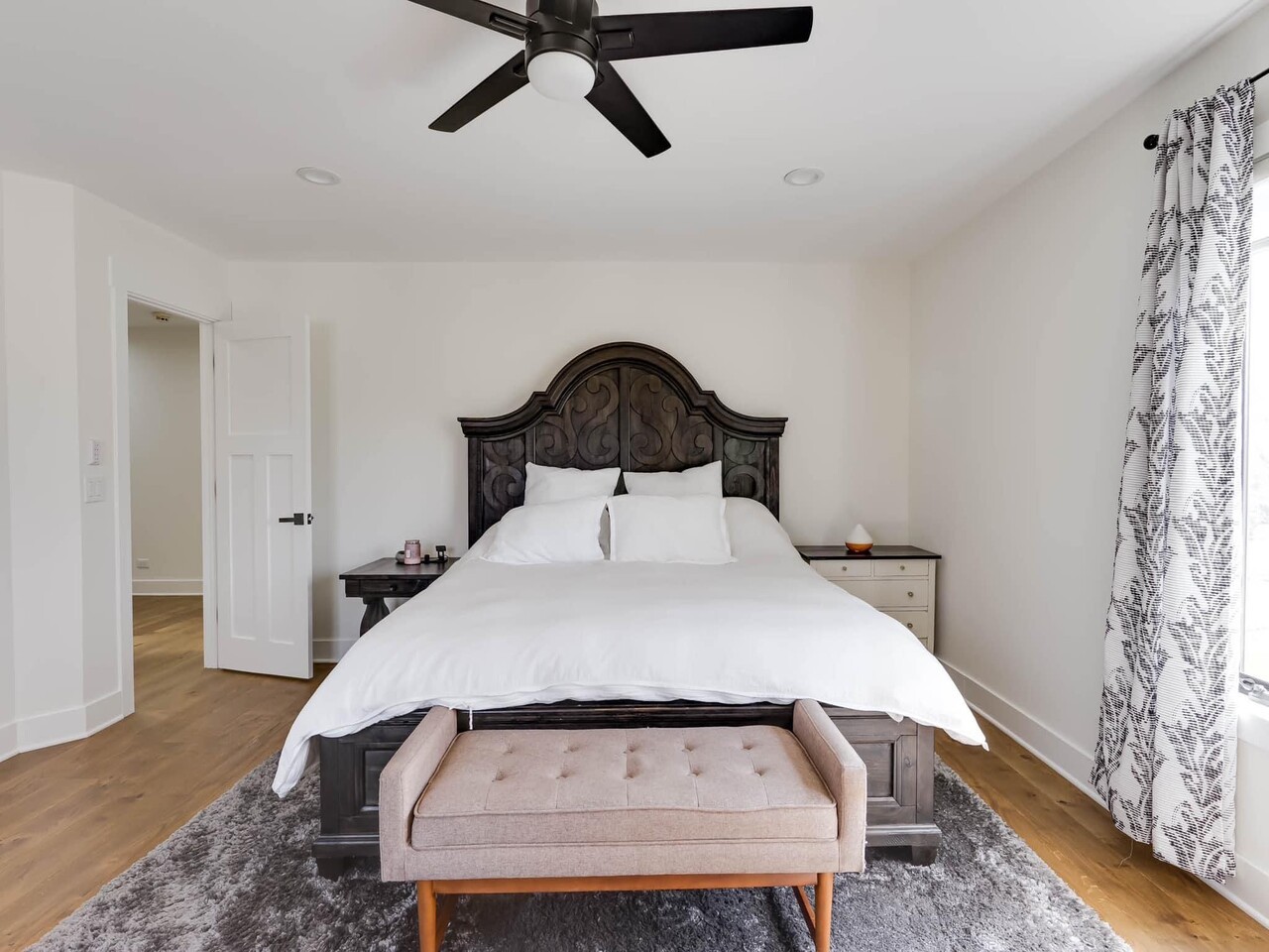 707 West Woodland Road Lake Bluff, IL 60044 - Photo 13 of 14 a bedroom with a bed and wooden floor