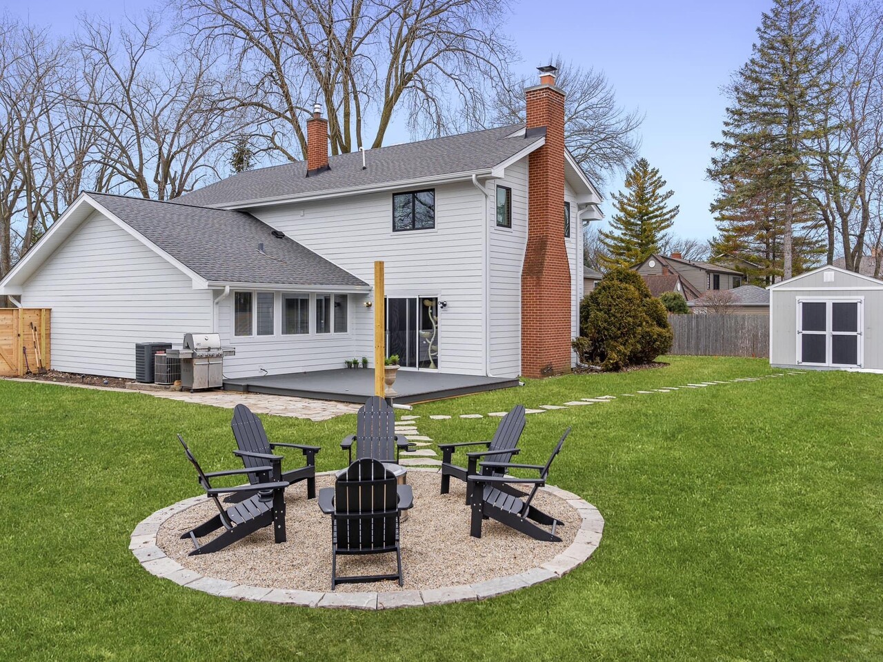 707 West Woodland Road Lake Bluff, IL 60044 - Photo 3 of 14 a view of a house with backyard