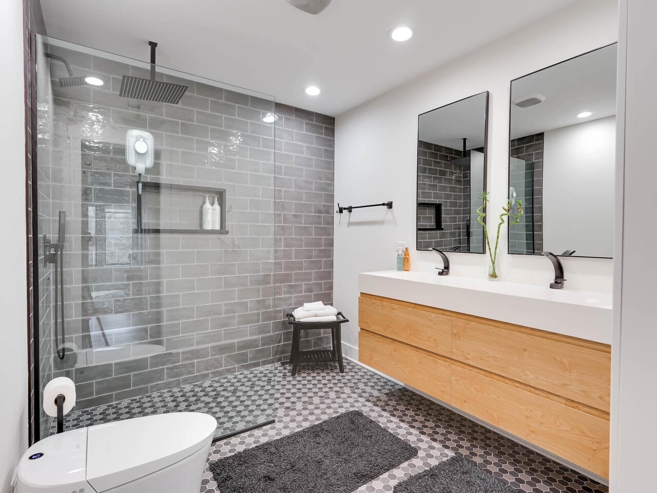 707 West Woodland Road Lake Bluff, IL 60044 - Photo 5 of 14 a bathroom with a sink a toilet and shower