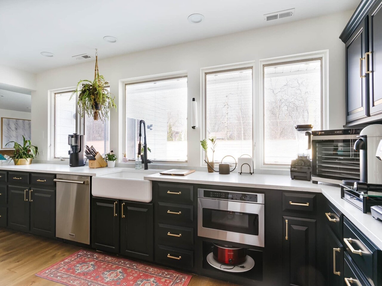 707 West Woodland Road Lake Bluff, IL 60044 - Photo 9 of 14 a kitchen with a sink stove and cabinets