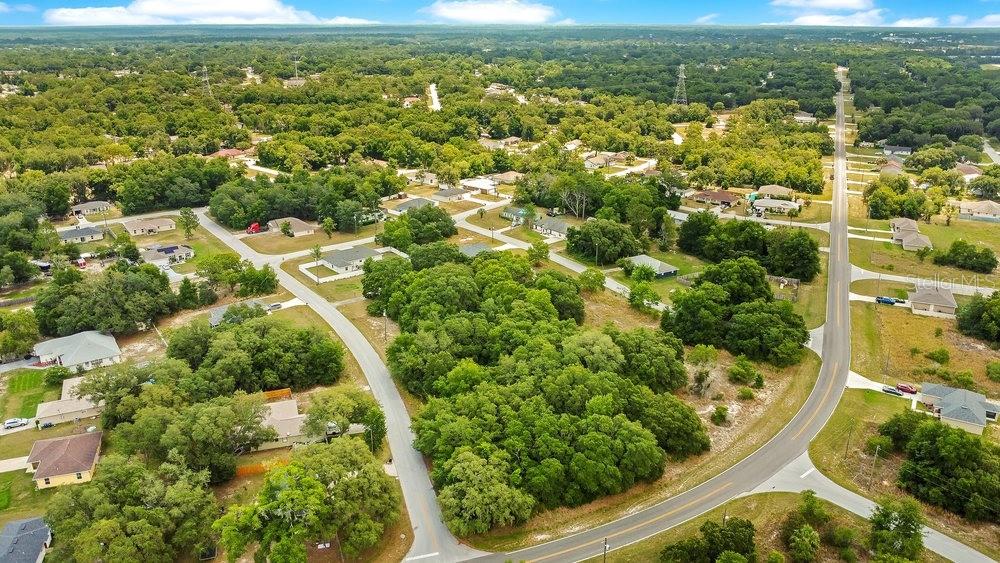 Bahia Road Ocala, FL 34472 - Photo 9 of 17 an aerial view of residential houses with outdoor space and trees