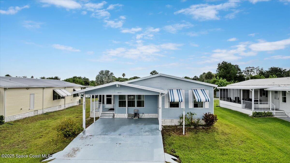 7653 Cedar Bark Road Micco, FL 32976 - Photo 2 of 24 01-CEDAR129