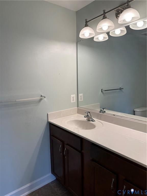 13342 Diamond Ridge Drive Midlothian, VA 23112 - Photo 16 of 19 a bathroom with a sink and a mirror