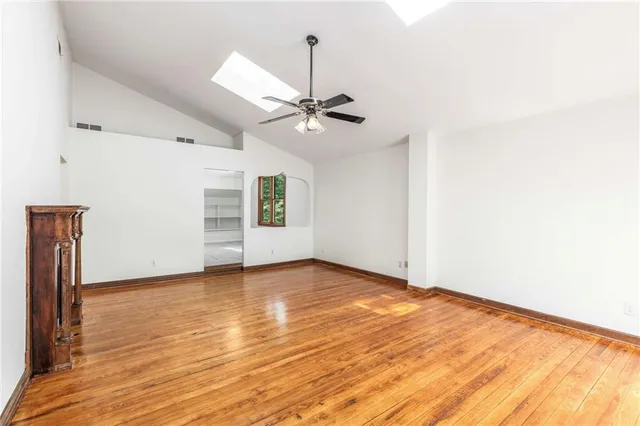 a kitchen with stainless steel appliances a refrigerator sink and microwave
