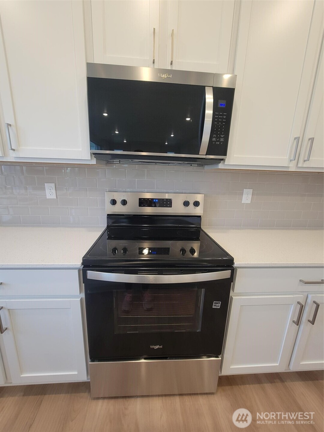 748 Holly Avenue, Unit 39 Buckley, WA 98321 - Photo 14 of 29 a stove top oven sitting inside of a kitchen