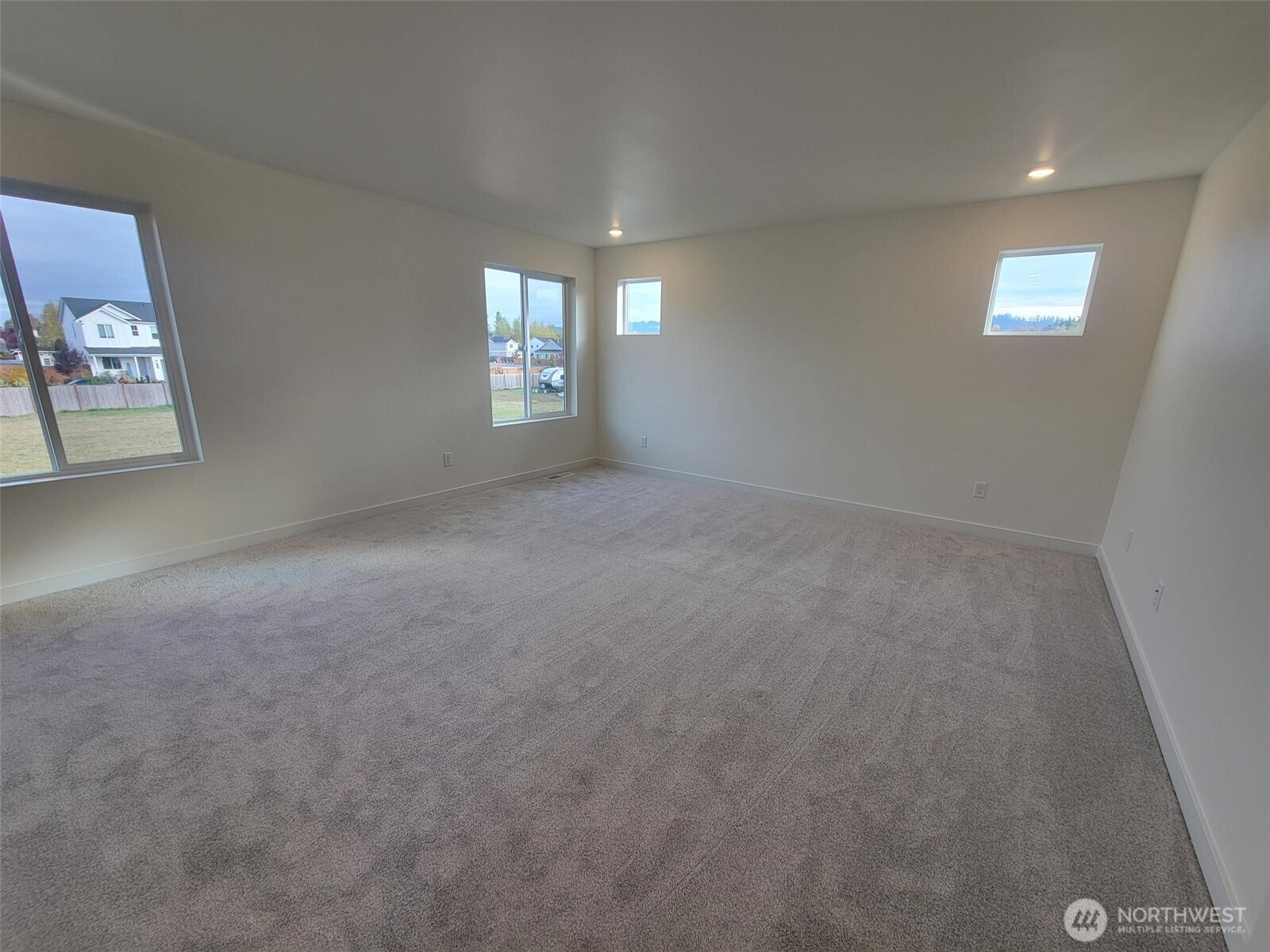 748 Holly Avenue, Unit 39 Buckley, WA 98321 - Photo 19 of 29 a view of empty room with windows