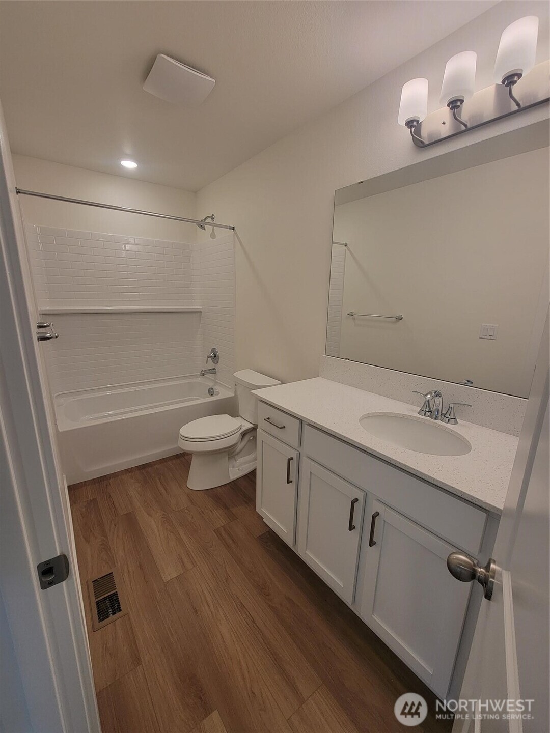 748 Holly Avenue, Unit 39 Buckley, WA 98321 - Photo 25 of 29 a bathroom with a double vanity sink toilet and mirror