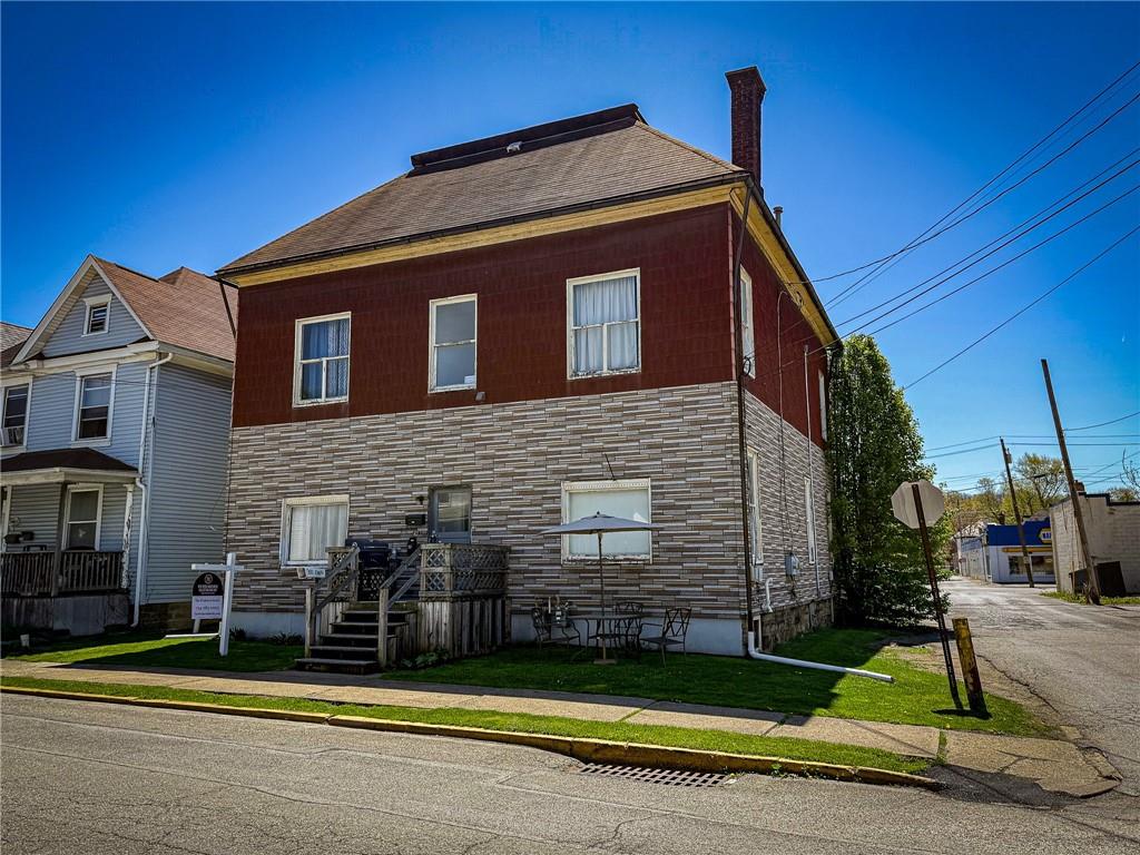 a view of a house with a swimming pool