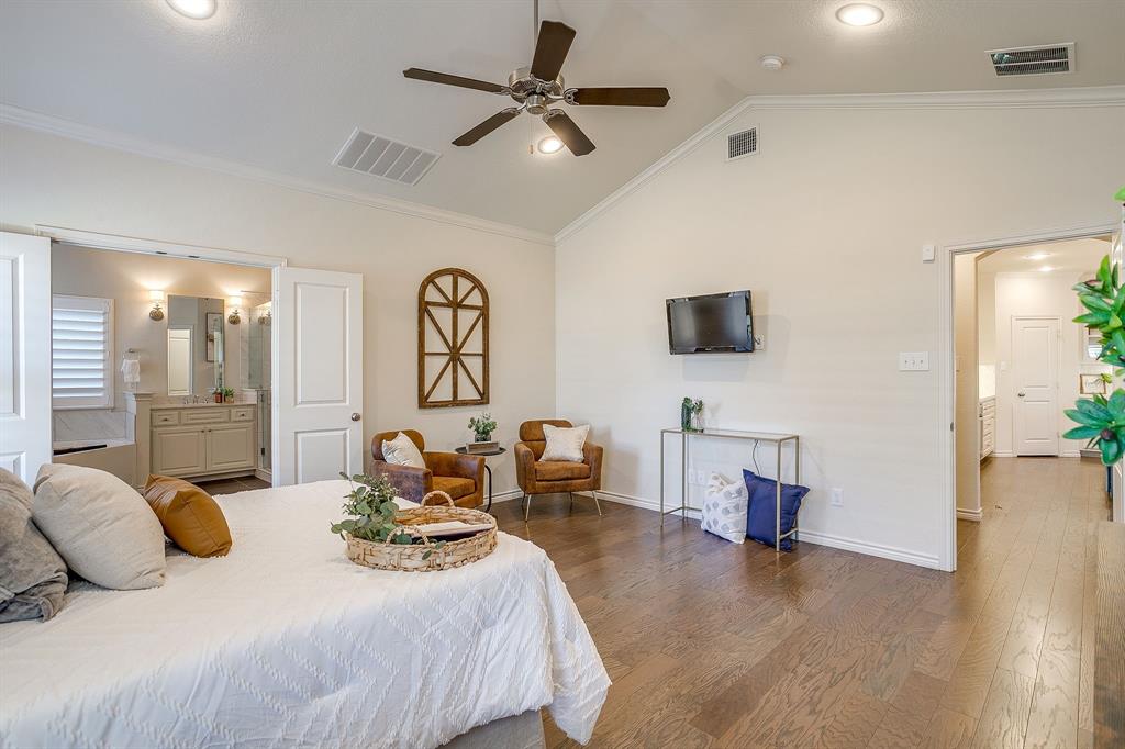 100 Grey Stone Street Aledo, TX 76008 - Photo 16 of 40 a bedroom with furniture and a flat screen tv