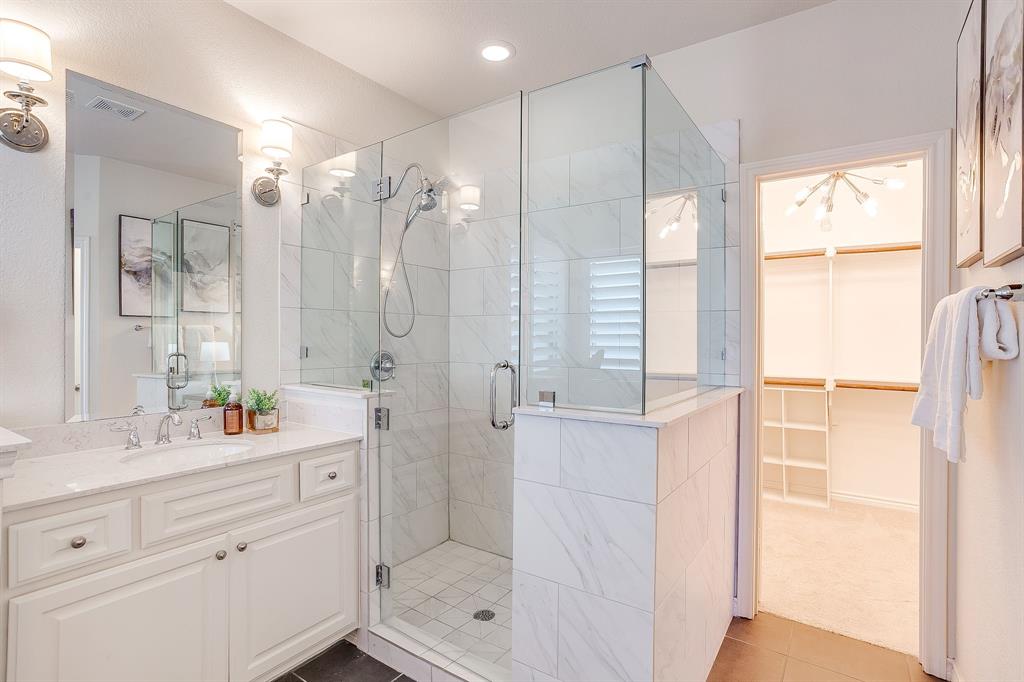 100 Grey Stone Street Aledo, TX 76008 - Photo 19 of 40 a bathroom with a shower sink and mirror