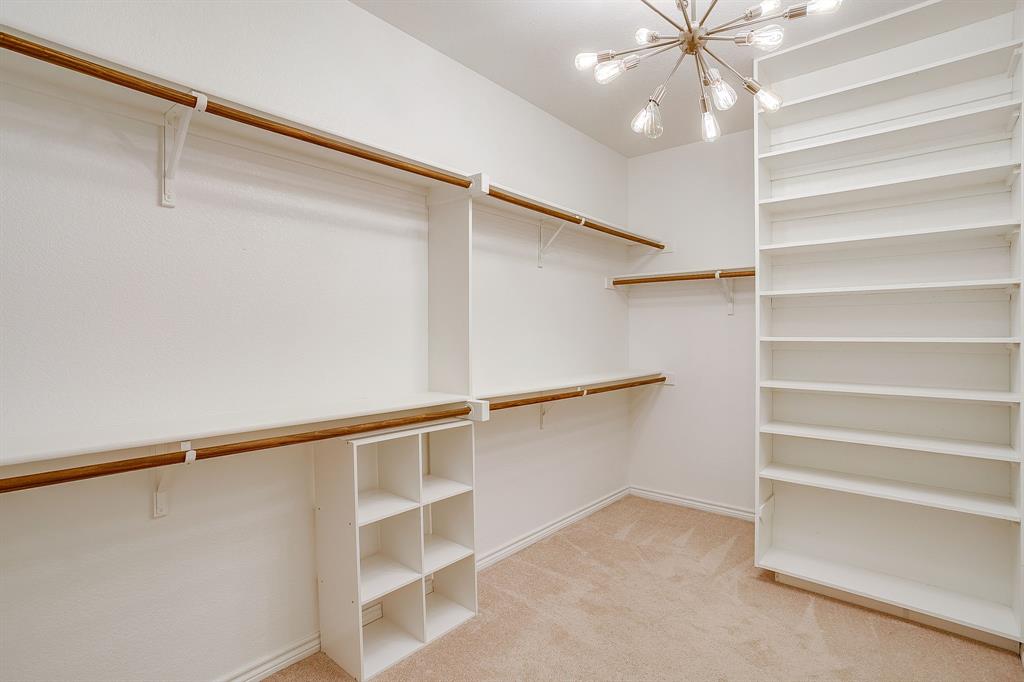 100 Grey Stone Street Aledo, TX 76008 - Photo 20 of 40 a view of an empty walk in closet