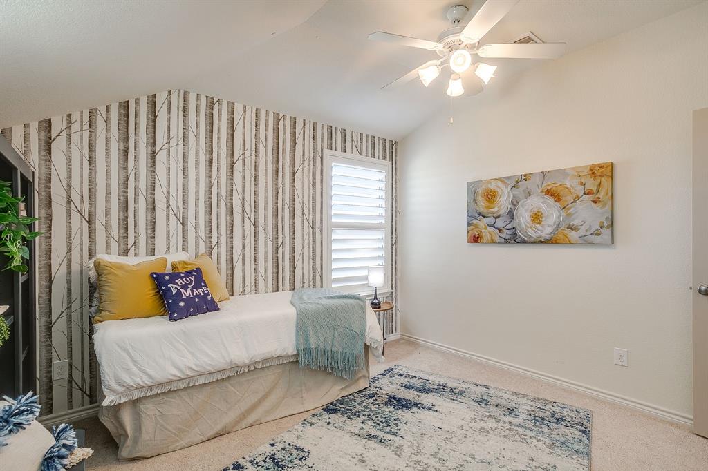 100 Grey Stone Street Aledo, TX 76008 - Photo 22 of 40 a bedroom with a bed and a window