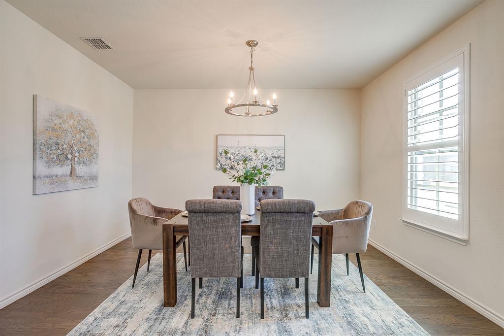 100 Grey Stone Street Aledo, TX 76008 - Photo 4 of 40 a view of a dining room with furniture window and outside view