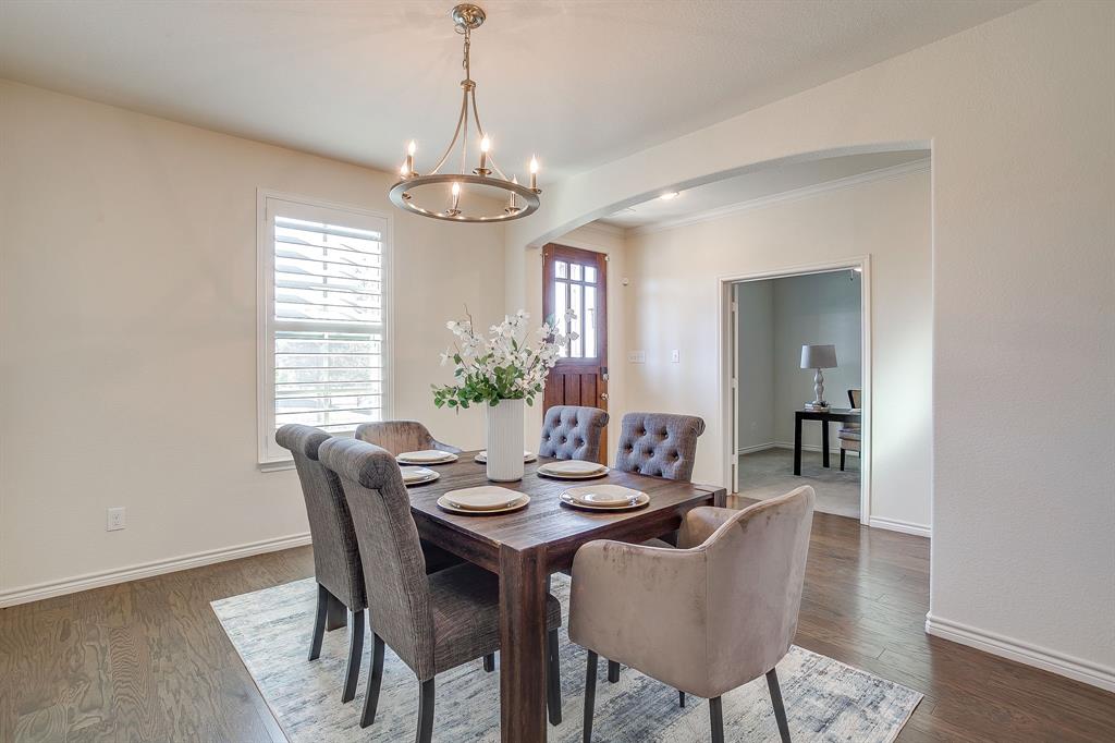 100 Grey Stone Street Aledo, TX 76008 - Photo 5 of 40 a view of a dining room with furniture window and wooden floor