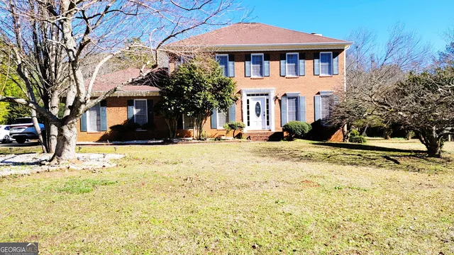 a front view of house with yard