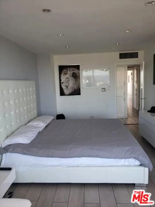 10501 Wilshire Boulevard, Unit 2103 Los Angeles, CA 90024 - Photo 15 of 19 a view of a bedroom