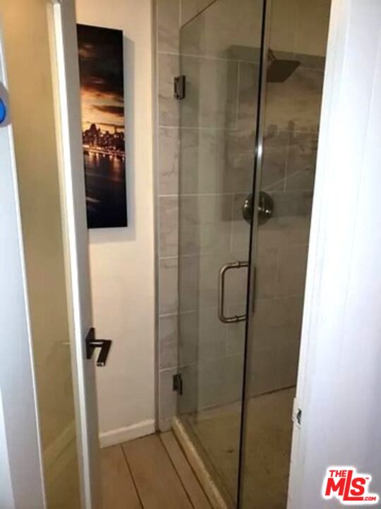 10501 Wilshire Boulevard, Unit 2103 Los Angeles, CA 90024 - Photo 17 of 19 a bathroom with a shower