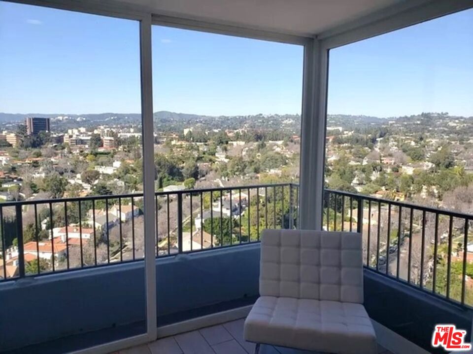 10501 Wilshire Boulevard, Unit 2103 Los Angeles, CA 90024 - Photo 4 of 19 a view of a balcony with furniture