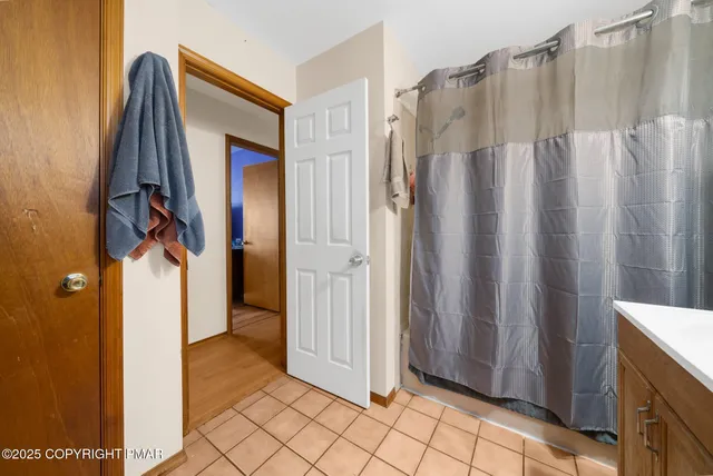 a view of walk in closet with window