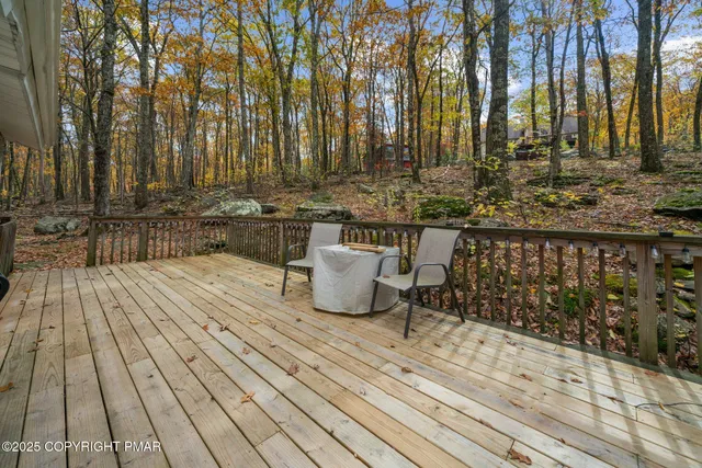 a pathway of a house with a yard