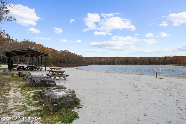 a view of a terrace with sitting area