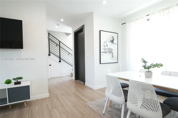a workspace with furniture and wooden floor