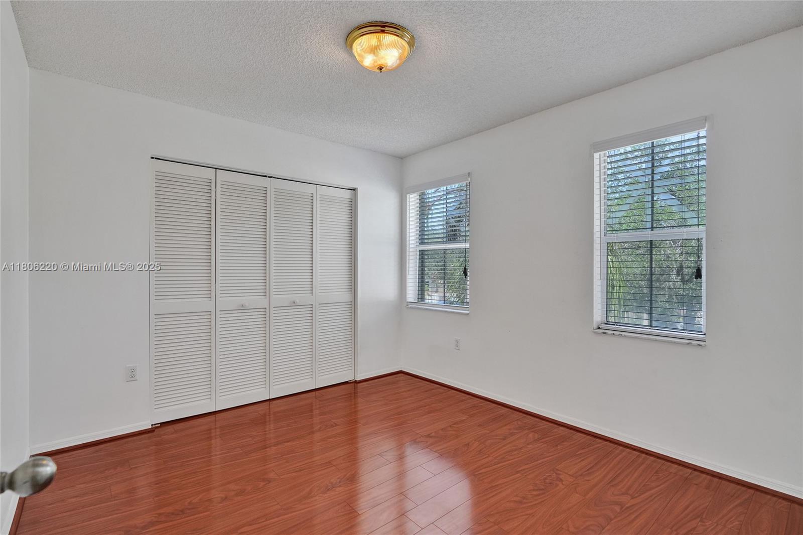3910 Fern Forest Road Cooper City, FL 33026 - Photo 22 of 38 an empty room with a empty space and a window