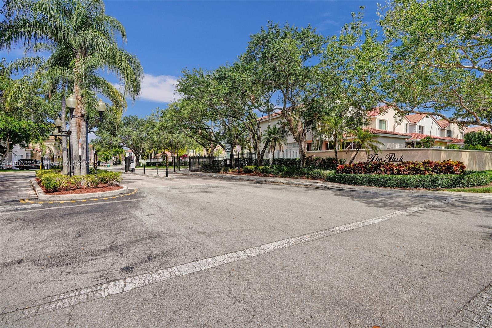 3910 Fern Forest Road Cooper City, FL 33026 - Photo 5 of 38 a view of street with houses