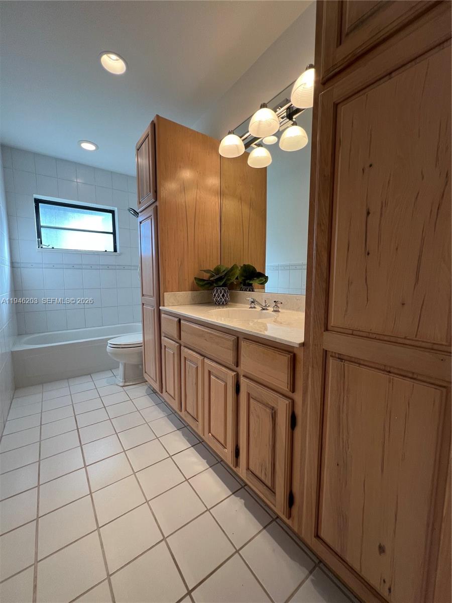 13100 Southwest 108th Place Miami, FL 33176 - Photo 11 of 16 a bathroom with a sink a vanity and a mirror
