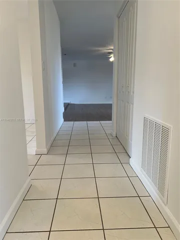 a kitchen with a stove and a microwave