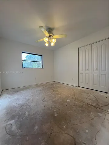 a view of a hallway with a chandelier