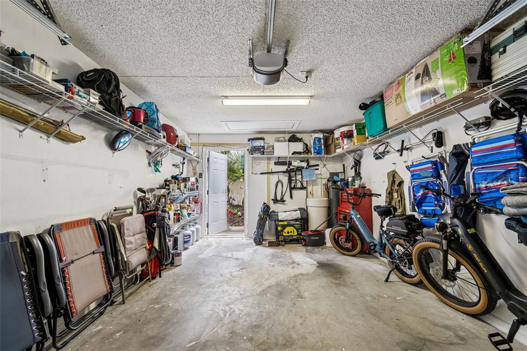 6499 99th Way North, Unit 18B St. Petersburg, FL 33708 - Photo 51 of 98 a view of a storage room with gym equipment