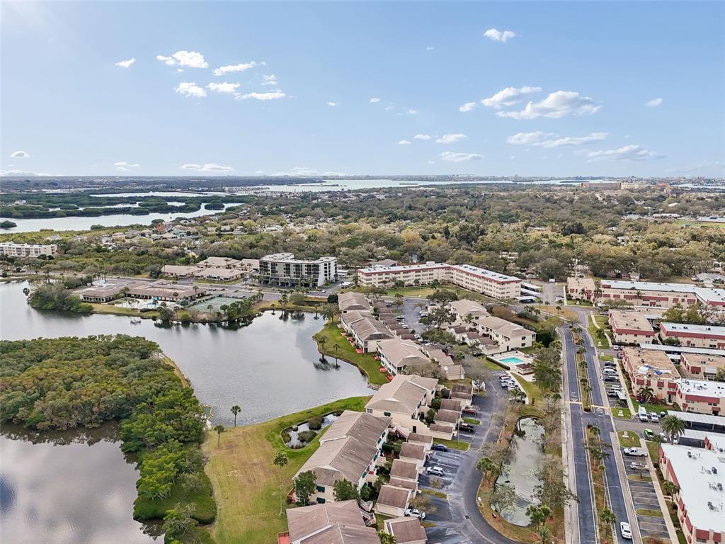 6499 99th Way North, Unit 18B St. Petersburg, FL 33708 - Photo 69 of 98 an aerial view of a city
