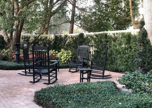 a bench sitting in middle of a yard