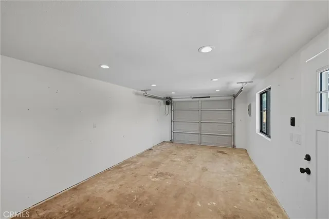 a view of swimming pool with a lounge chair