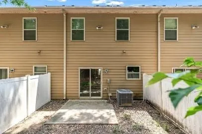 a view of a yard with plants and a small yard