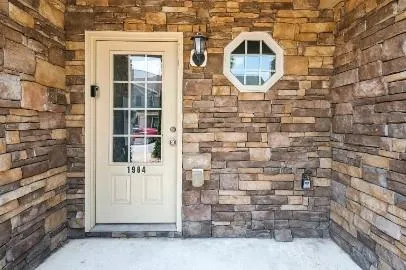 a front view of a house with a window