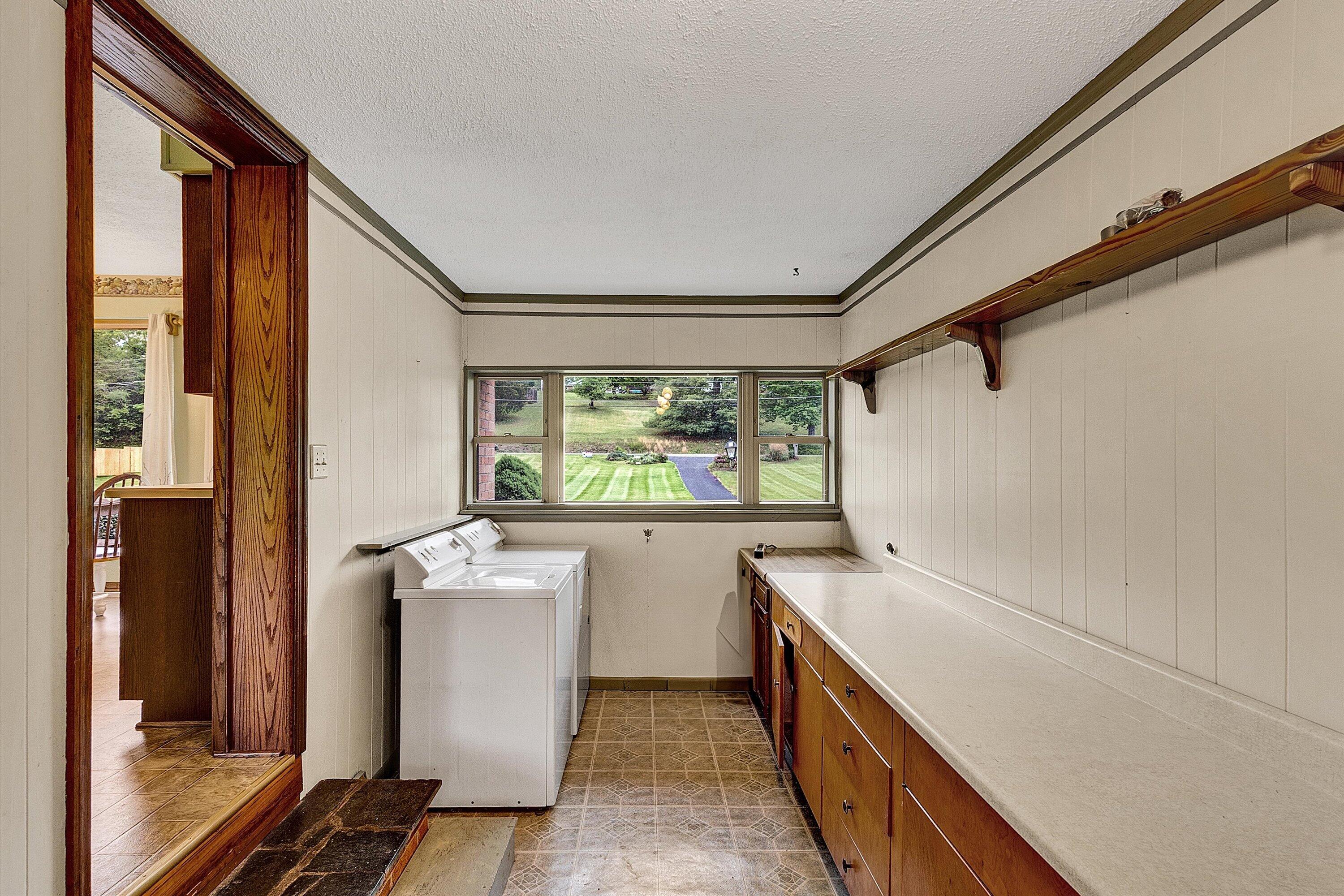 2015 Evergreen Road Covington, VA 24426 - Photo 12 of 46 a kitchen with stainless steel appliances a sink and a window