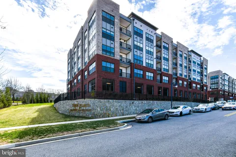 a front view of a building with street view