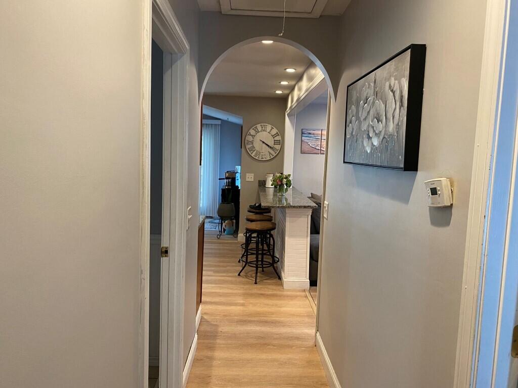 21 Mashpee Neck Road Mashpee, MA 02649 - Photo 14 of 17 a view of a hallway with dining area