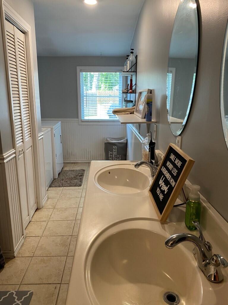 21 Mashpee Neck Road Mashpee, MA 02649 - Photo 17 of 17 a utility room with dryer and washer